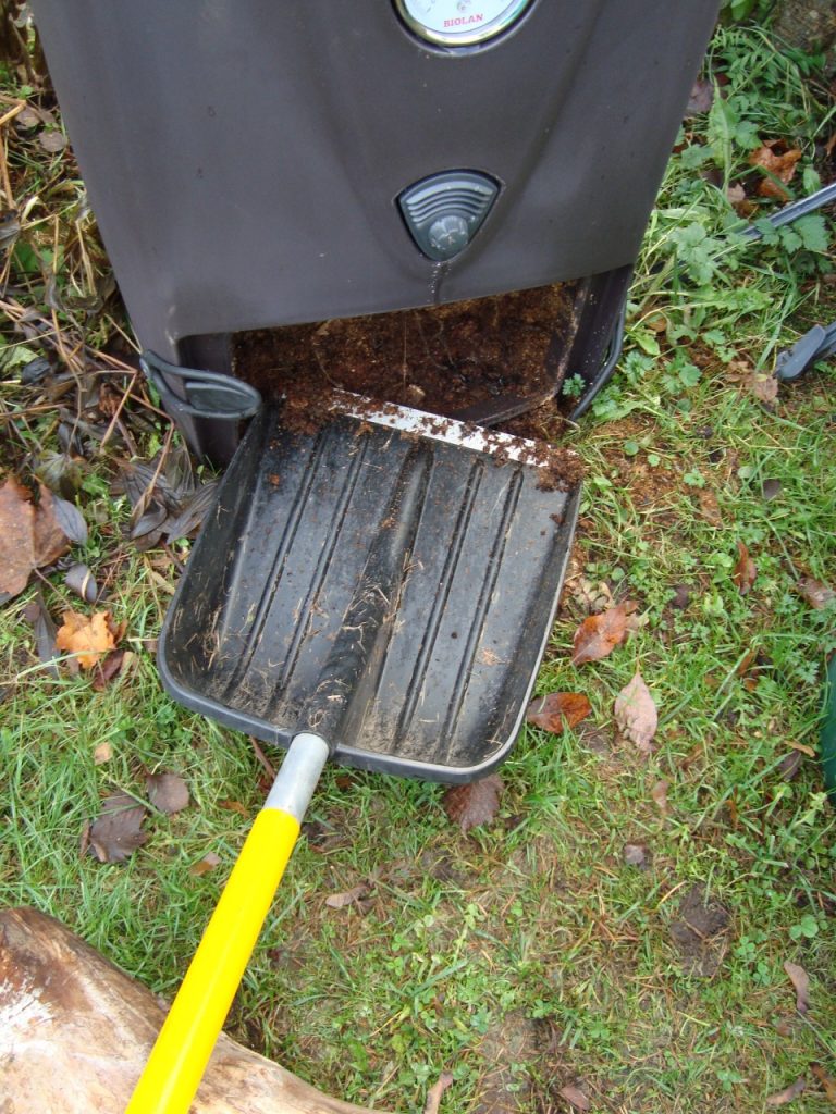 emptying a compost bin